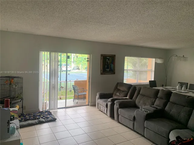 $250,000 | 17911 Northwest 68th Avenue, Unit O104, Hialeah, FL 33015