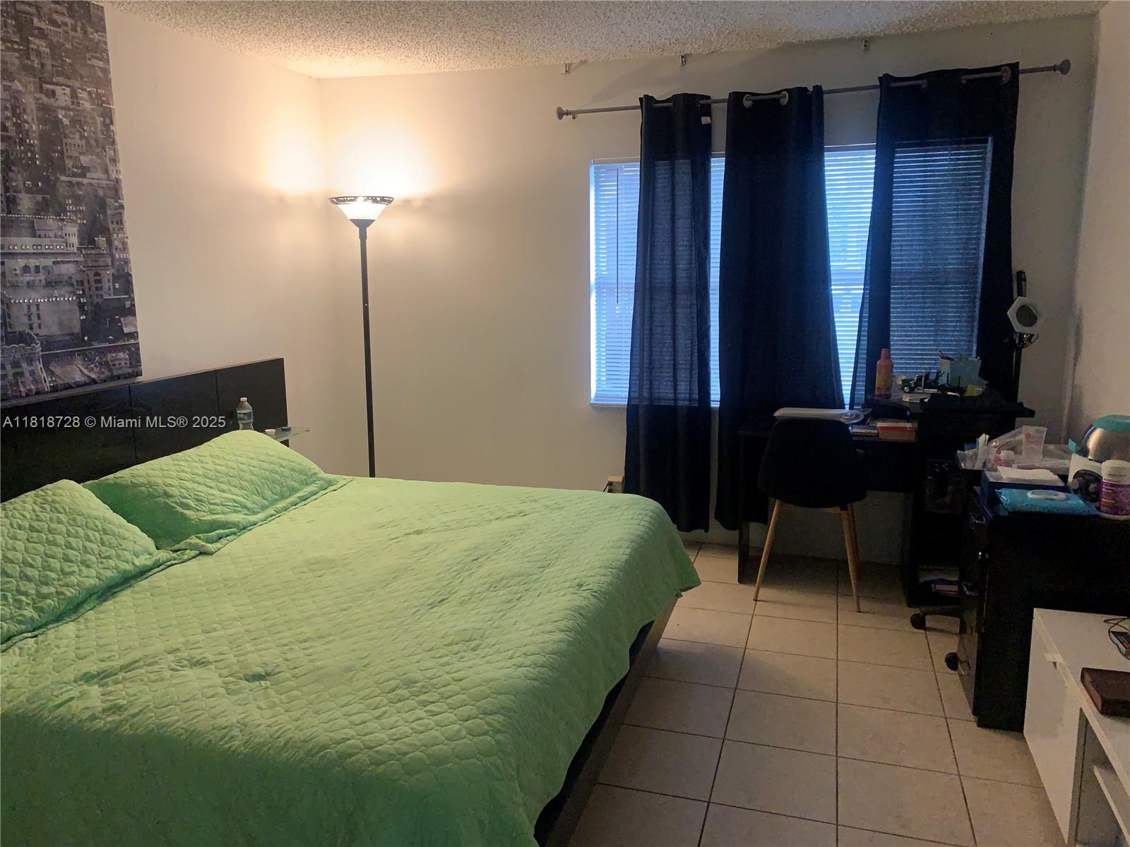 17911 Northwest 68th Avenue, Unit O104 Hialeah, FL 33015 - Photo 8 of 31