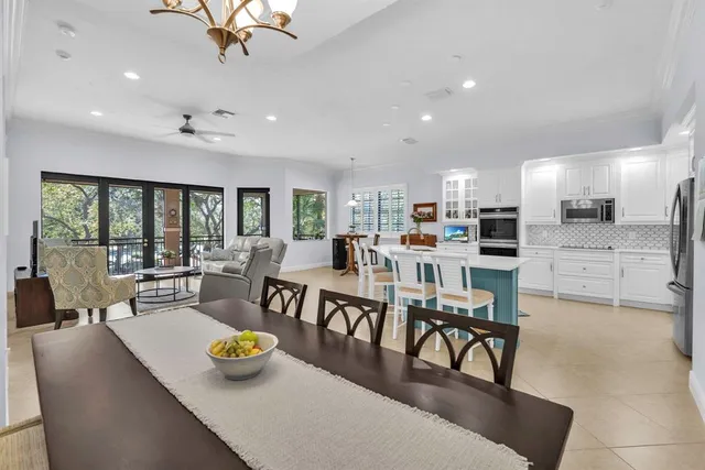 a bench sitting in a room next to a window