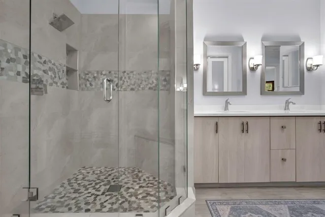 a living room with furniture and a dining table