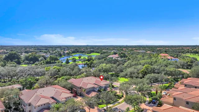 a view of a garden with a fountain