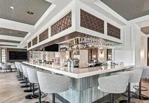 an aerial view of a residential houses with outdoor space