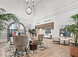 an aerial view of a golf course with a lake view