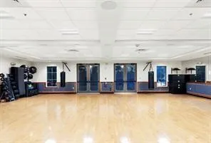 an outdoor sitting area with chairs