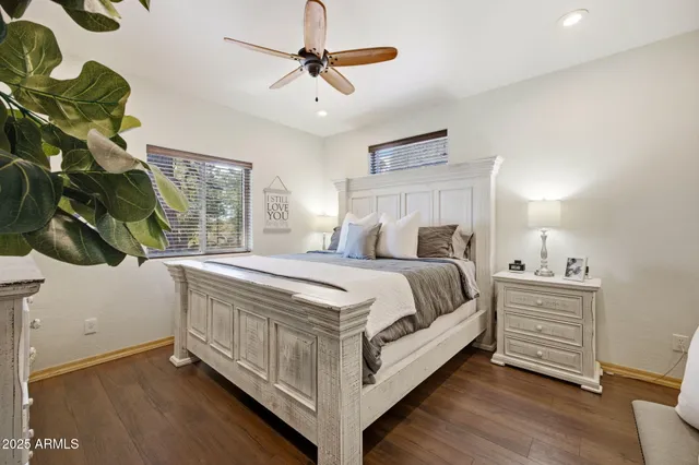 a kitchen with stainless steel appliances granite countertop a kitchen island a stove a table and chairs