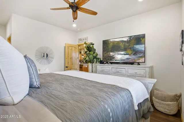 a kitchen with sink and chairs