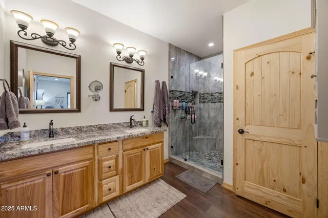 a bedroom with a bed dresser and a window