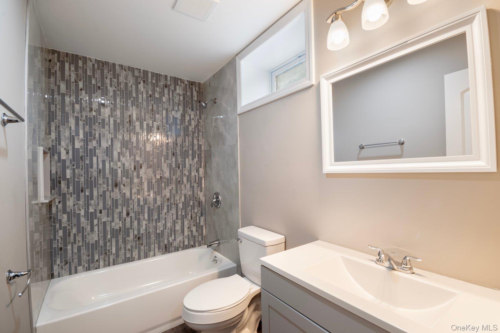 568 Granny Road Medford, NY 11763 - Photo 13 of 22 Full bathroom featuring shower combination and vanity