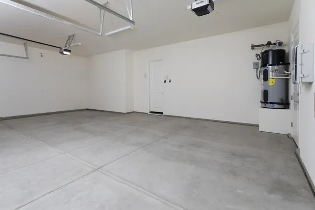 a view of a storage & utility room with a sink