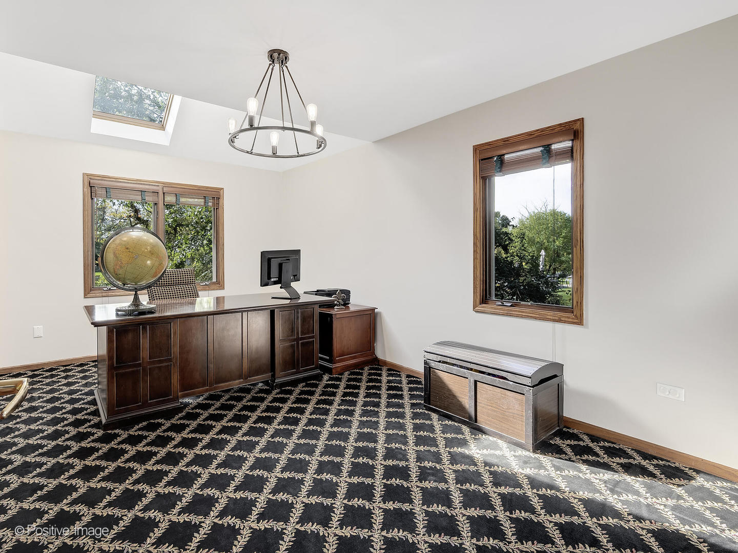 541 68th Street Willowbrook, IL 60527 - Photo 17 of 43 a view of a hallway with wooden floor and furniture