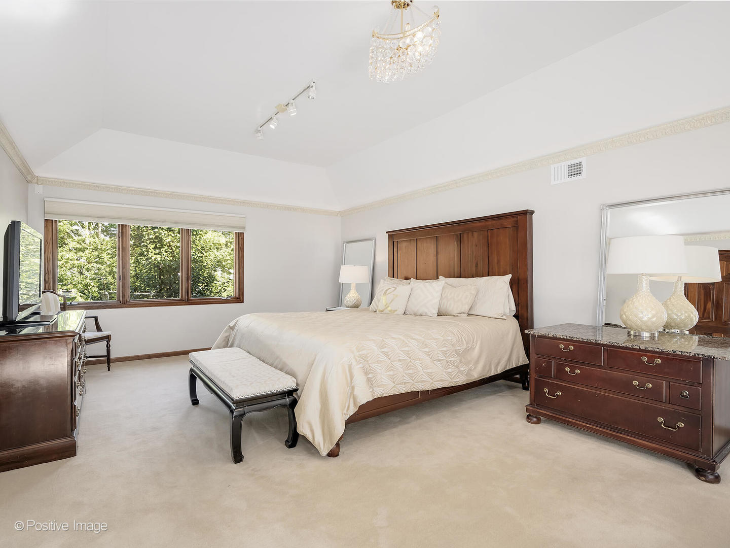 541 68th Street Willowbrook, IL 60527 - Photo 21 of 43 a bedroom with a bed and a couch