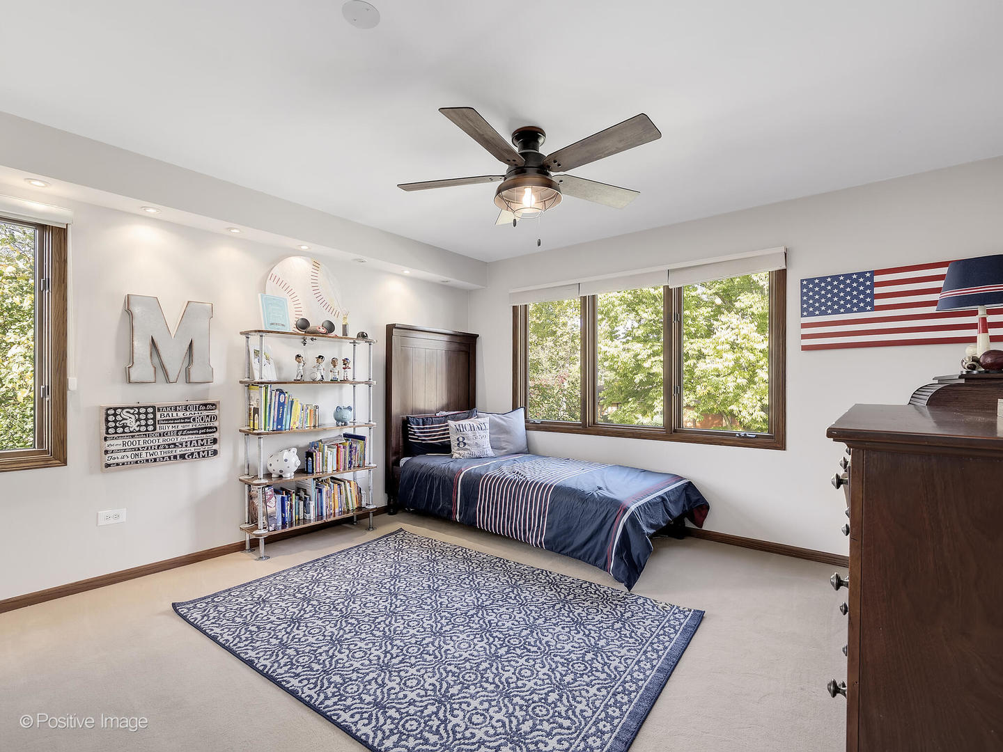 541 68th Street Willowbrook, IL 60527 - Photo 24 of 43 a living room with furniture and a rug