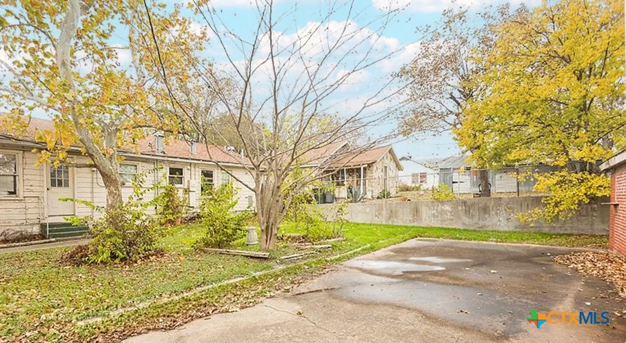 111 South 33rd Street Temple, TX 76504 - Photo 22 of 28 a view of a street with a building in the background
