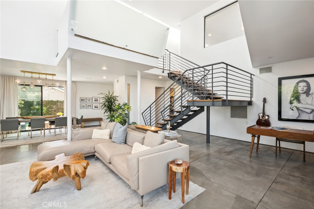 2831 Ridge Drive Laguna Beach, CA 92651 - Photo 5 of 21 a living room with furniture and a wooden floor