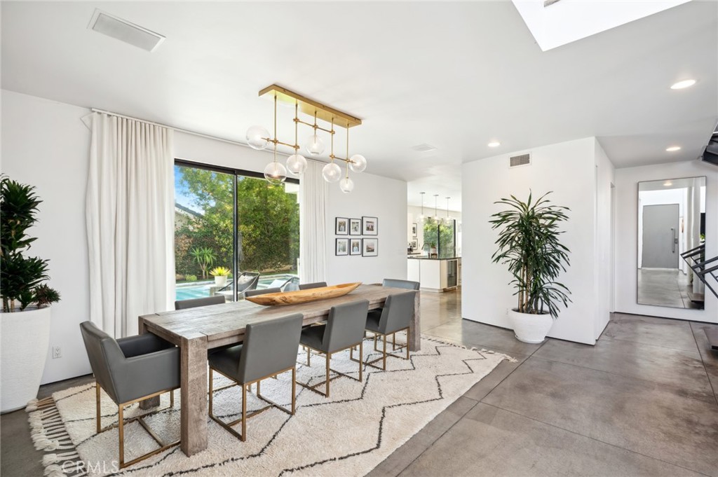 2831 Ridge Drive Laguna Beach, CA 92651 - Photo 7 of 21 a dining room with furniture window and wooden floor