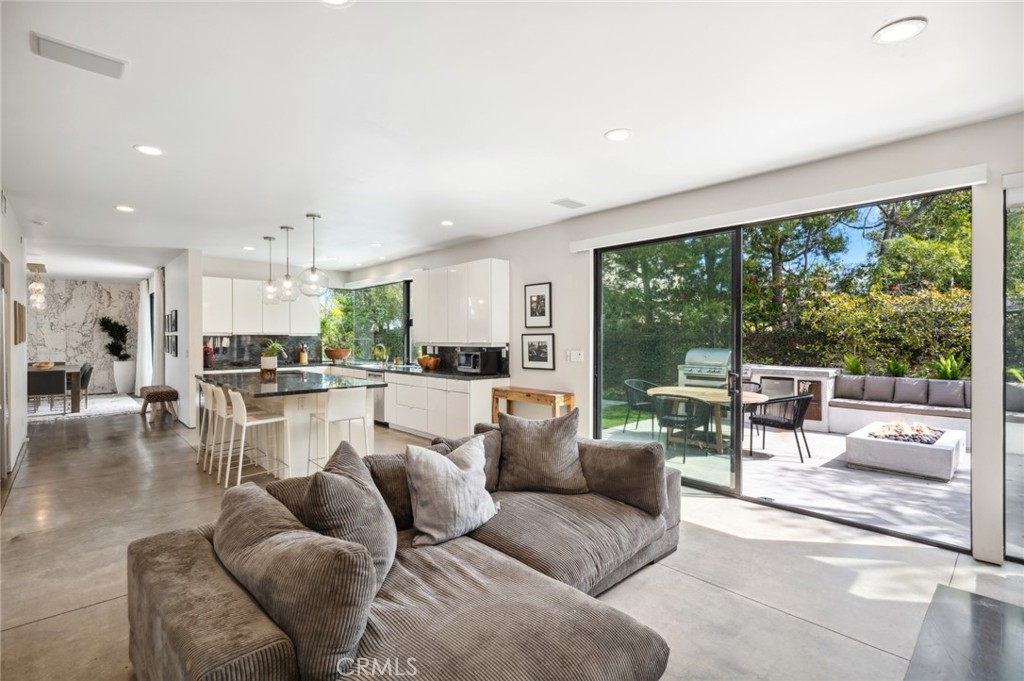 2831 Ridge Drive Laguna Beach, CA 92651 - Photo 10 of 21 a living room with furniture and a large window