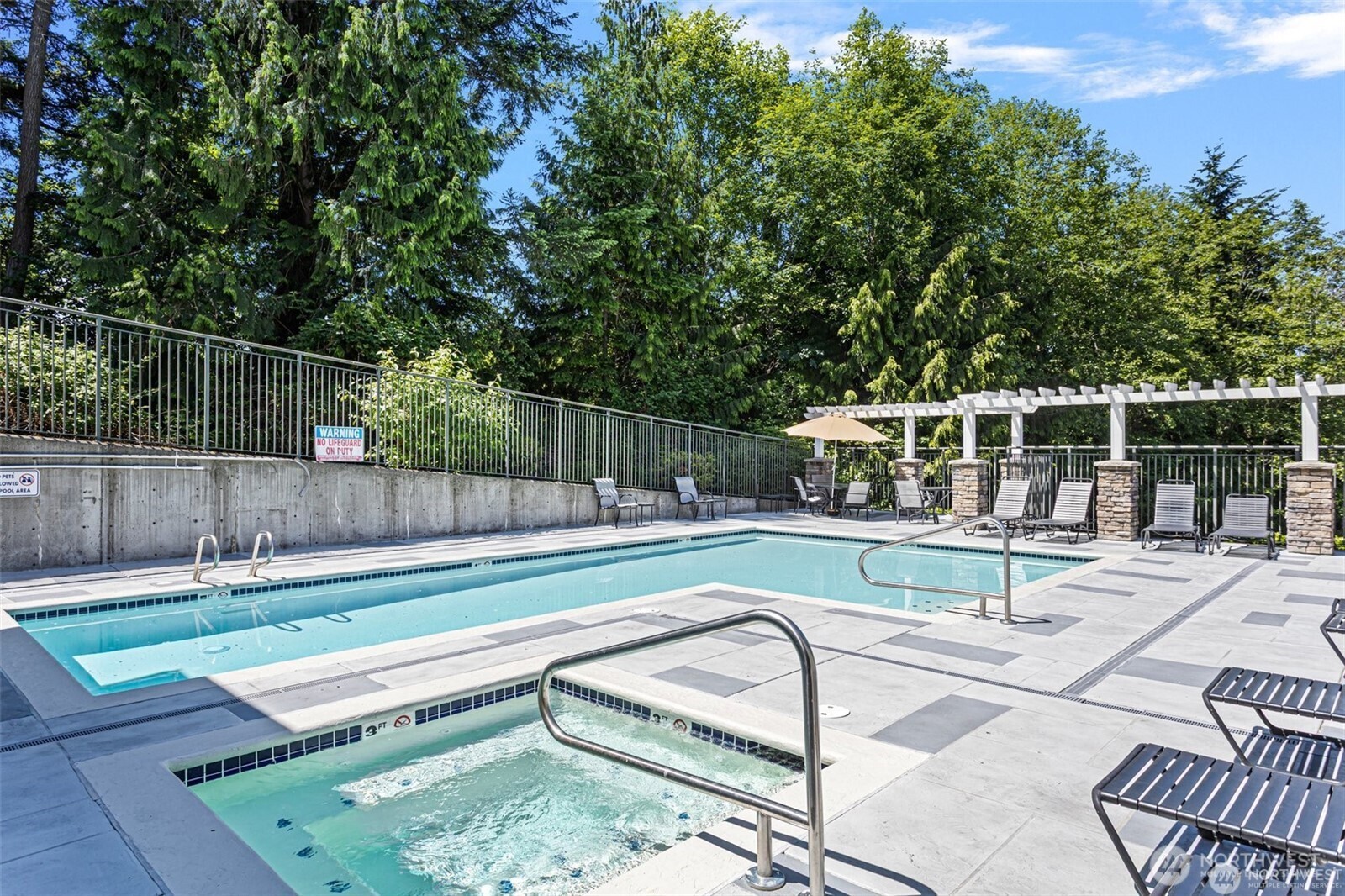 3918 243rd Place Southeast, Unit F204 Bothell, WA 98021 - Photo 32 of 32 a view of house with a backyard and a slide