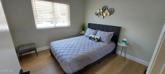 a view of a chairs and table in the patio