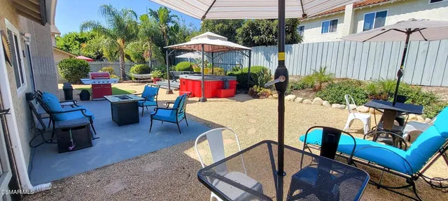 a store room with stainless steel appliances and furniture