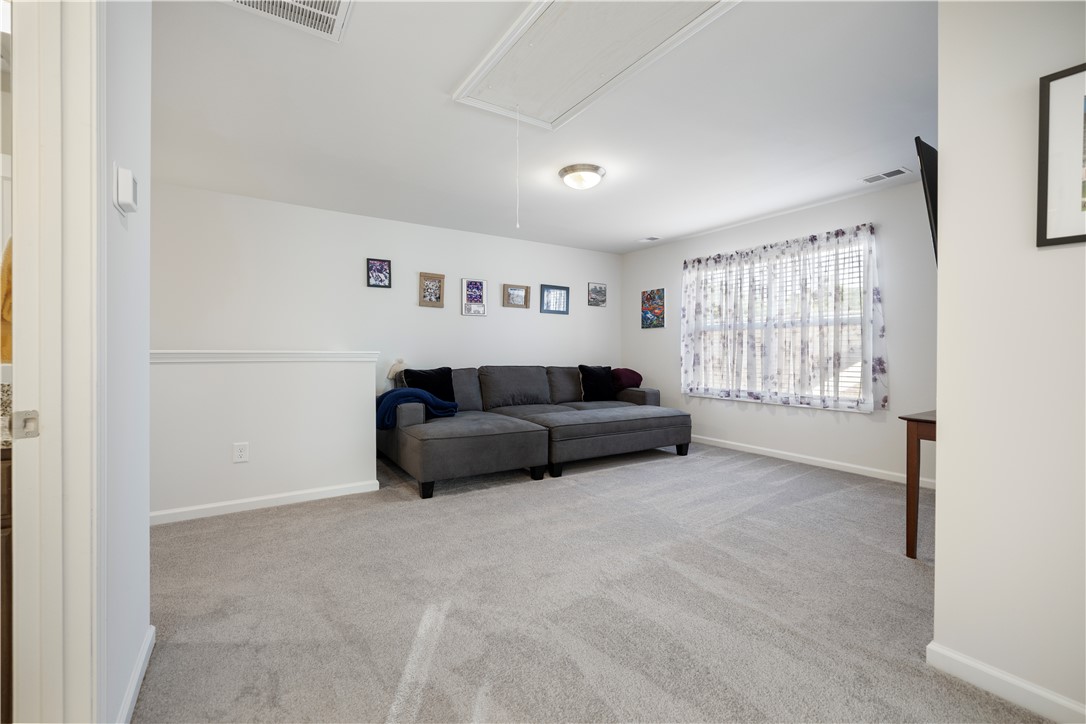 104 Village Main Anderson, SC 29621 - Photo 20 of 30 This flexible bonus room offers adaptable living space, perfect for various household needs.