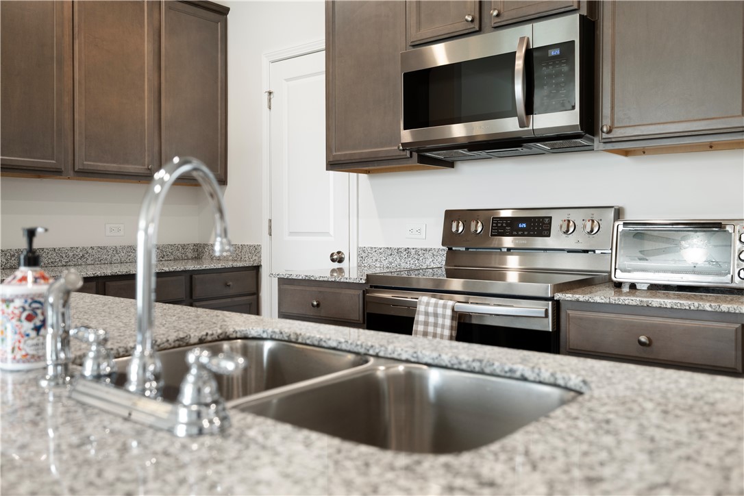 104 Village Main Anderson, SC 29621 - Photo 8 of 30 This functional kitchen provides a stylish culinary space, perfect for everyday living.