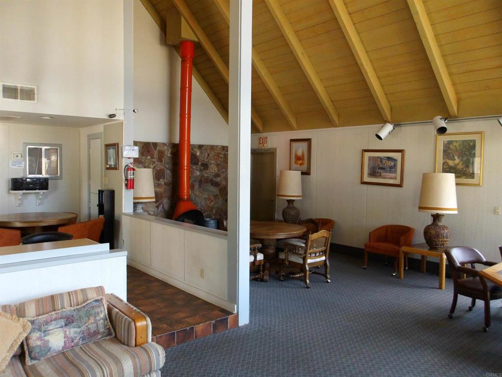 28857 Old Highway 80, Unit 3 Pine Valley, CA 91962 - Photo 13 of 15 a living room with furniture and a flat screen tv