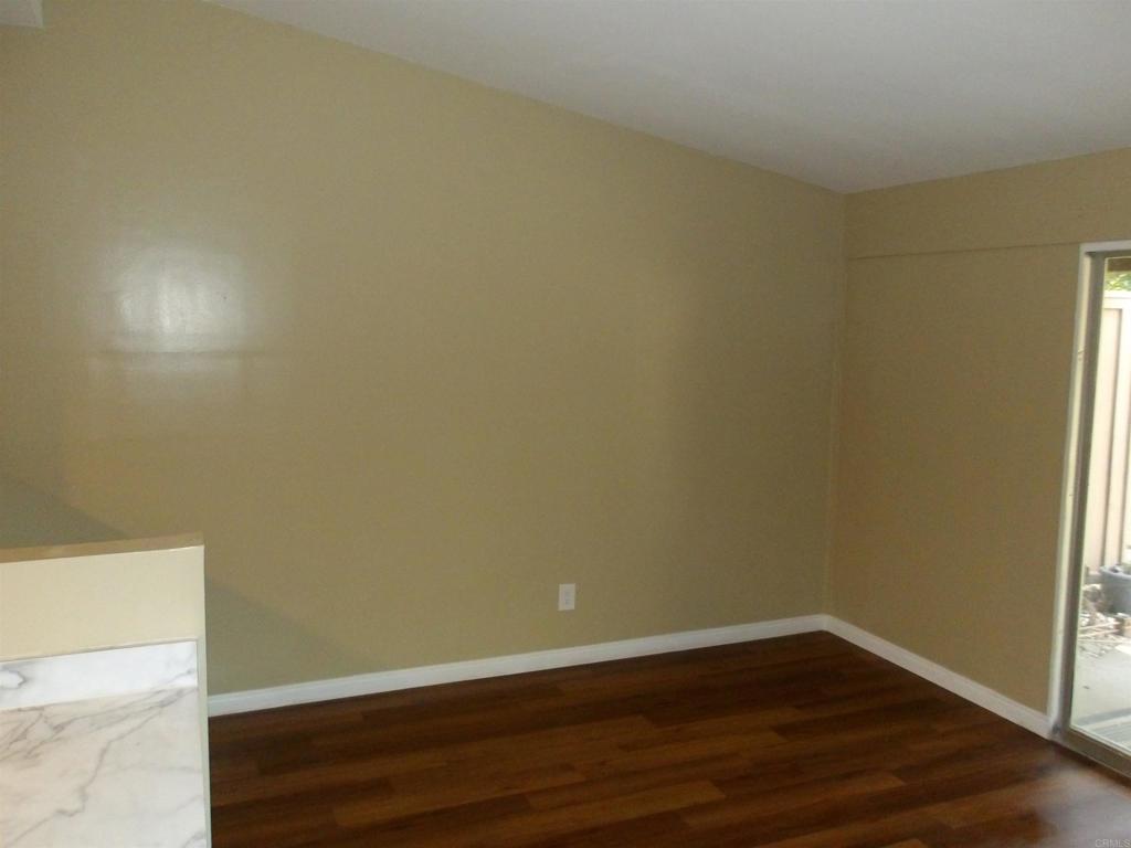 28857 Old Highway 80, Unit 3 Pine Valley, CA 91962 - Photo 3 of 15 a view of an empty room with wooden floor