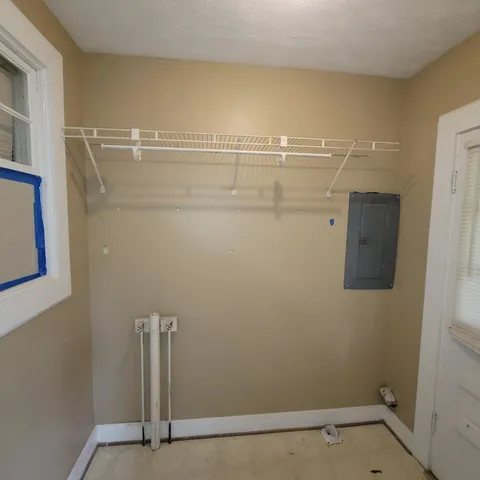 a view of a room with racks on the wall