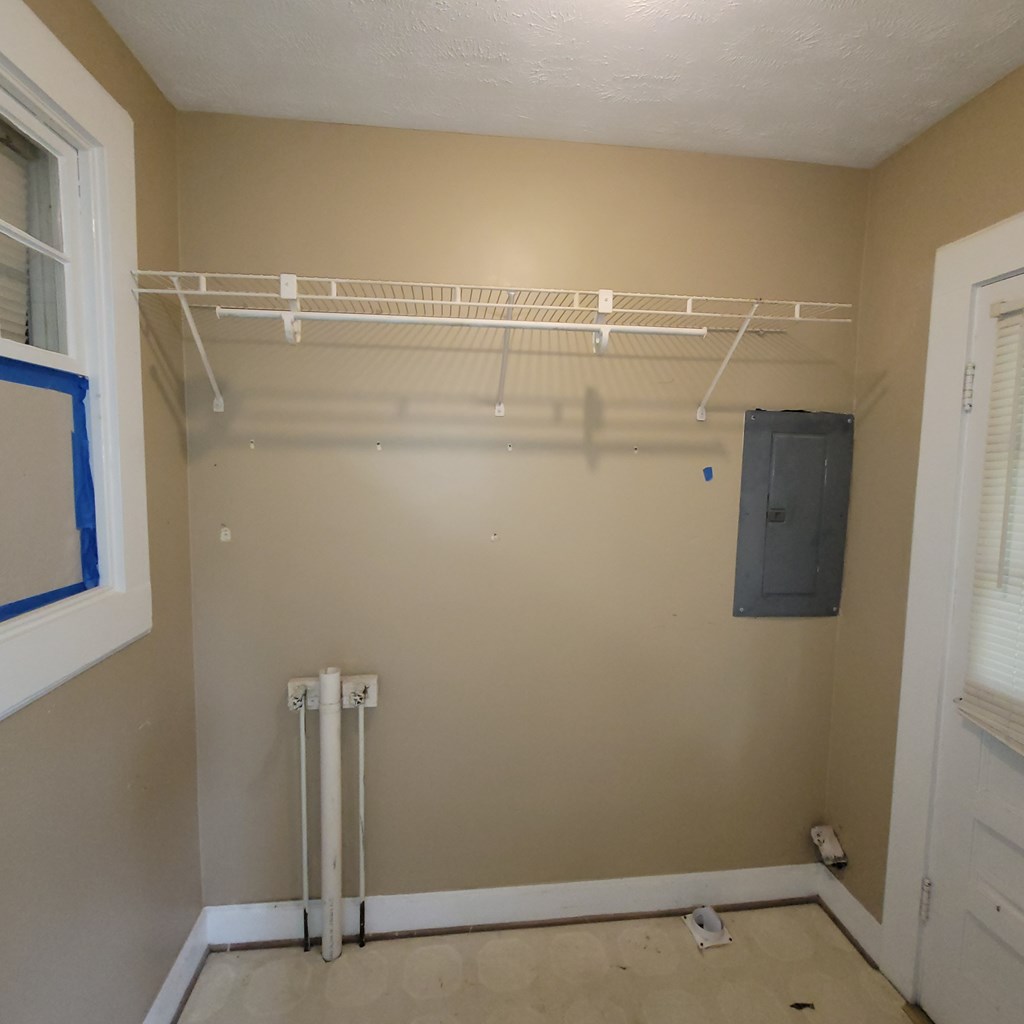 2220 Bell Street Columbus, GA 31906 - Photo 11 of 11 a view of a room with racks on the wall