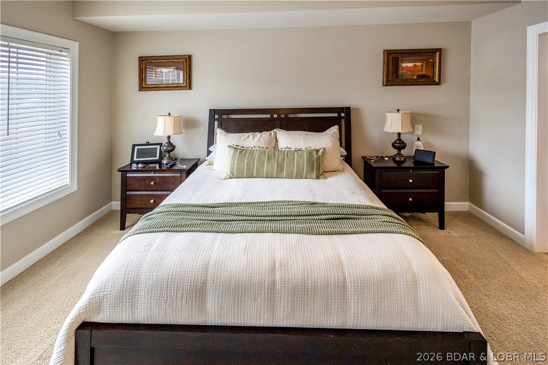 68 Lighthouse Road, Unit 121 Lake Ozark, MO 65049 - Photo 7 of 30 Master bedroom.