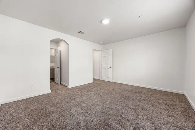 an empty room with a natural light