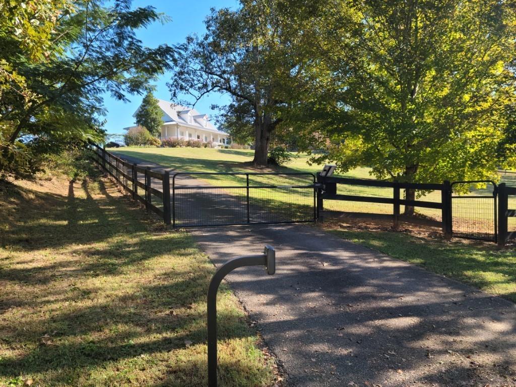 191 Knucklesville Road Rydal, GA 30171 - Photo 1 of 1 a view of park with bench and trees