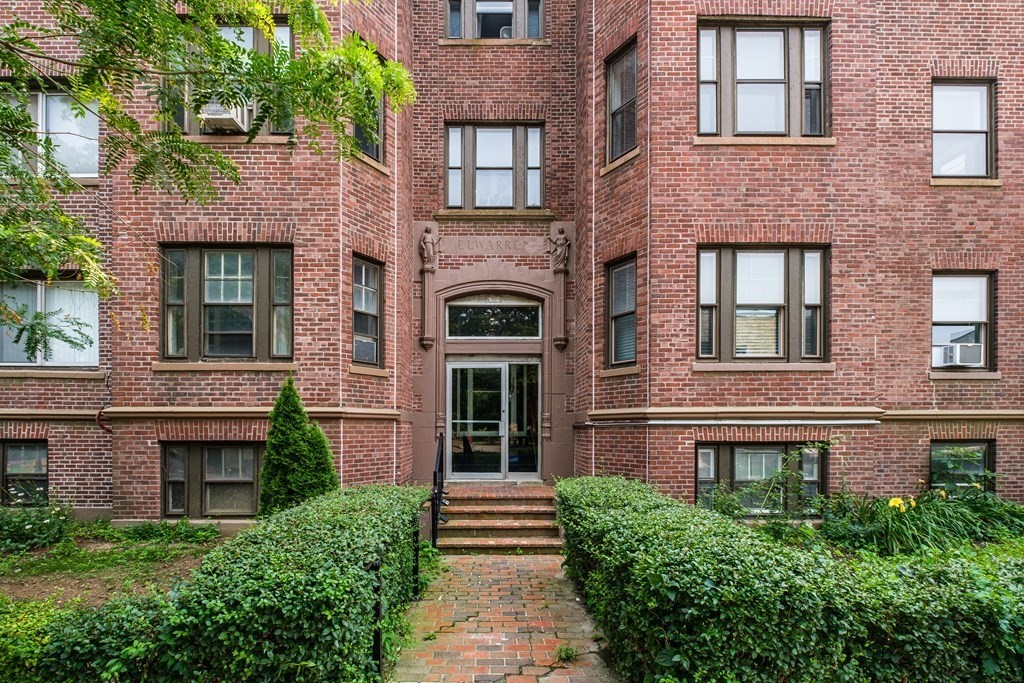 108 Washington Street, Unit 8 Boston, MA 02135 - Photo 14 of 18 a front view of a house with stairs