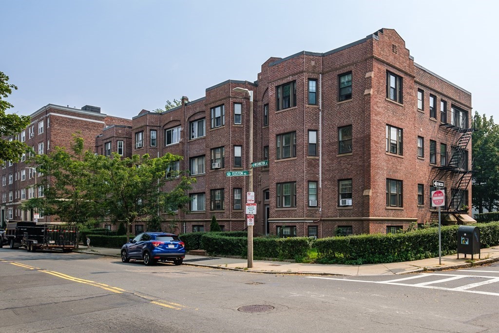 108 Washington Street, Unit 8 Boston, MA 02135 - Photo 18 of 18 a car parked in front of a building