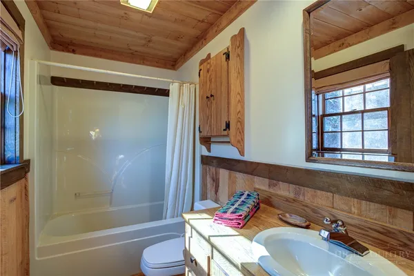 a bathroom with a sink and a bathtub