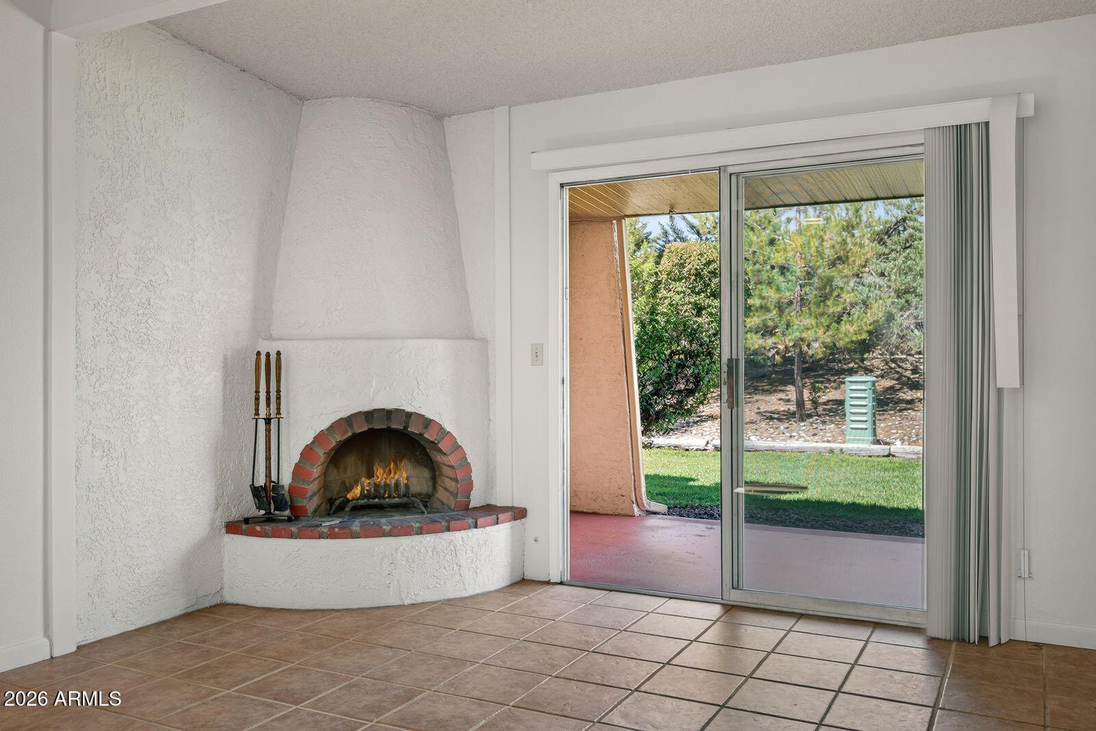 130 Castle Rock Road, Unit 46 Sedona, AZ 86351 - Photo 6 of 19 LIVING ROOM FIREPLACE