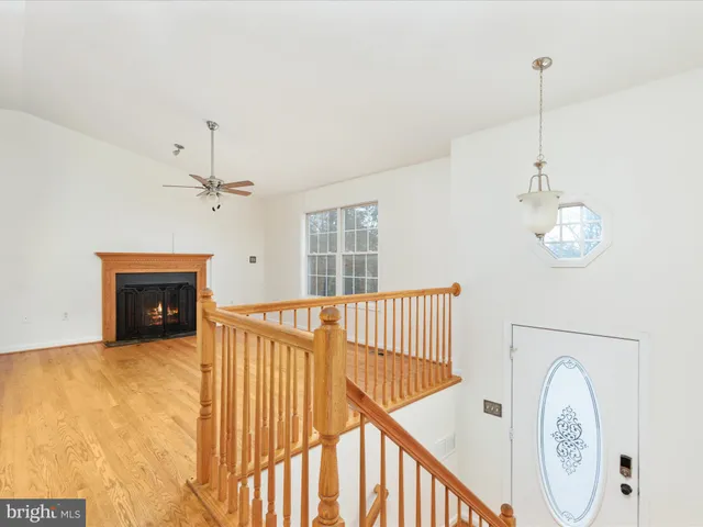 a view of a hallway with a chandelier