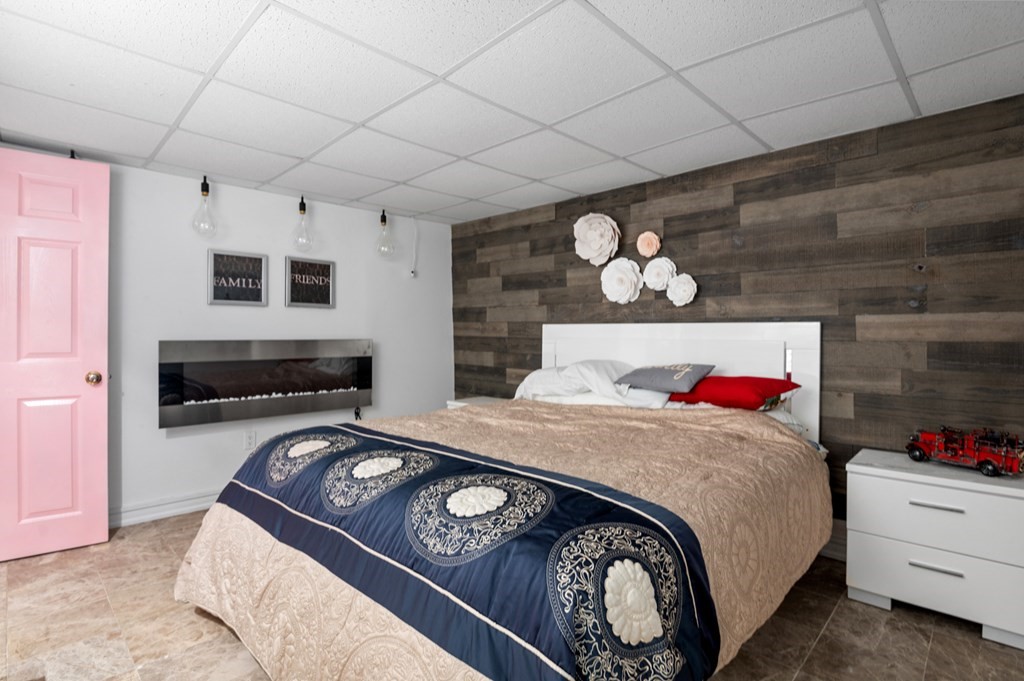 5 Michele Drive Salisbury, MA 01952 - Photo 13 of 38 a bedroom with a bed and a tv