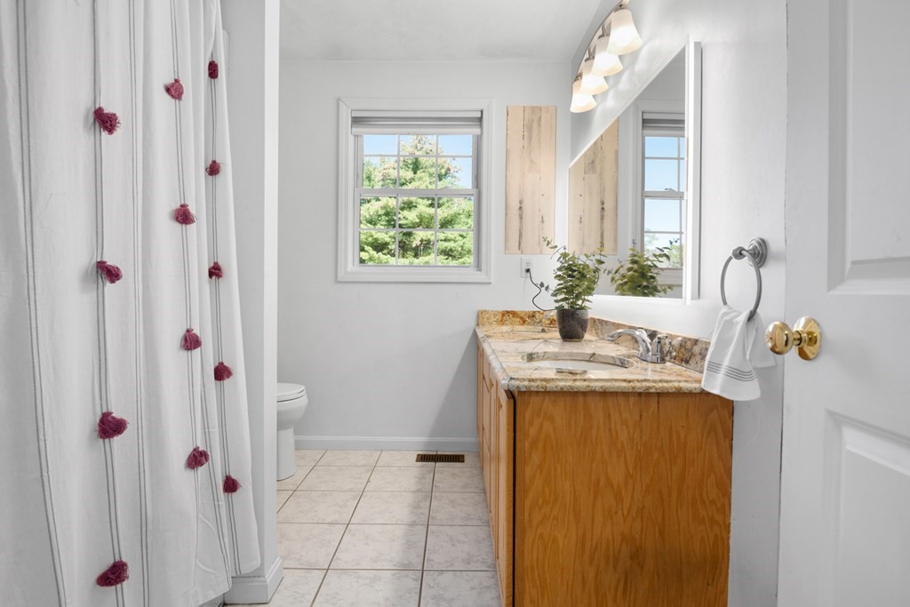 5 Michele Drive Salisbury, MA 01952 - Photo 19 of 38 a bathroom with a sink vanity granite tub and shower