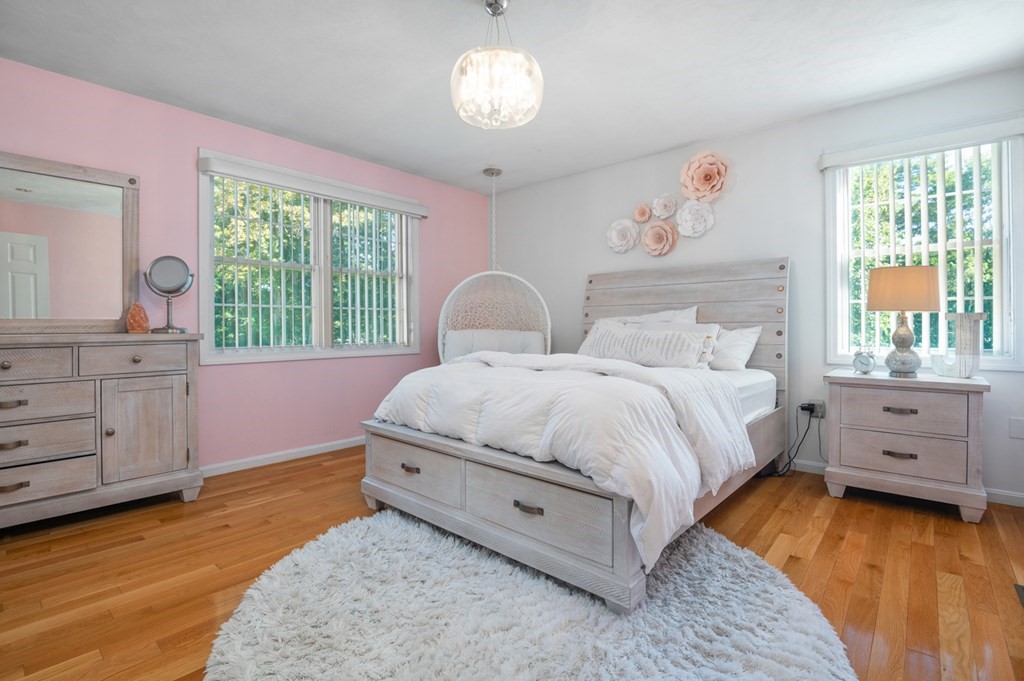 5 Michele Drive Salisbury, MA 01952 - Photo 21 of 38 a spacious bedroom with a bed and a dresser