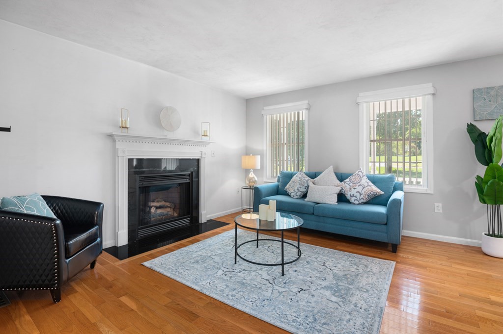 5 Michele Drive Salisbury, MA 01952 - Photo 34 of 38 a living room with furniture and a fireplace