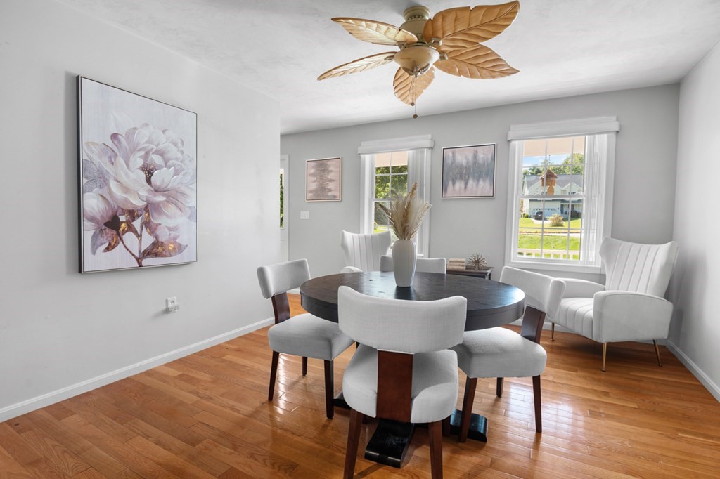 5 Michele Drive Salisbury, MA 01952 - Photo 37 of 38 a view of a dining room with furniture a chandelier and wooden floor