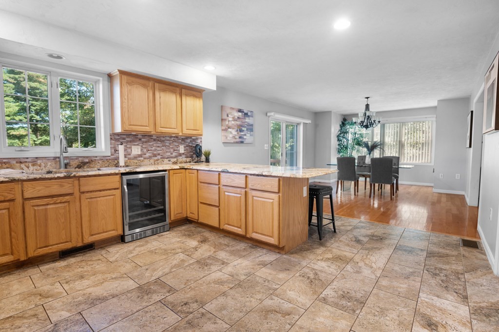 5 Michele Drive Salisbury, MA 01952 - Photo 38 of 38 a kitchen with a sink stove and cabinets