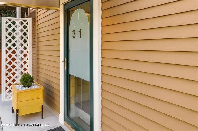 a spacious bedroom with a bed and a couch