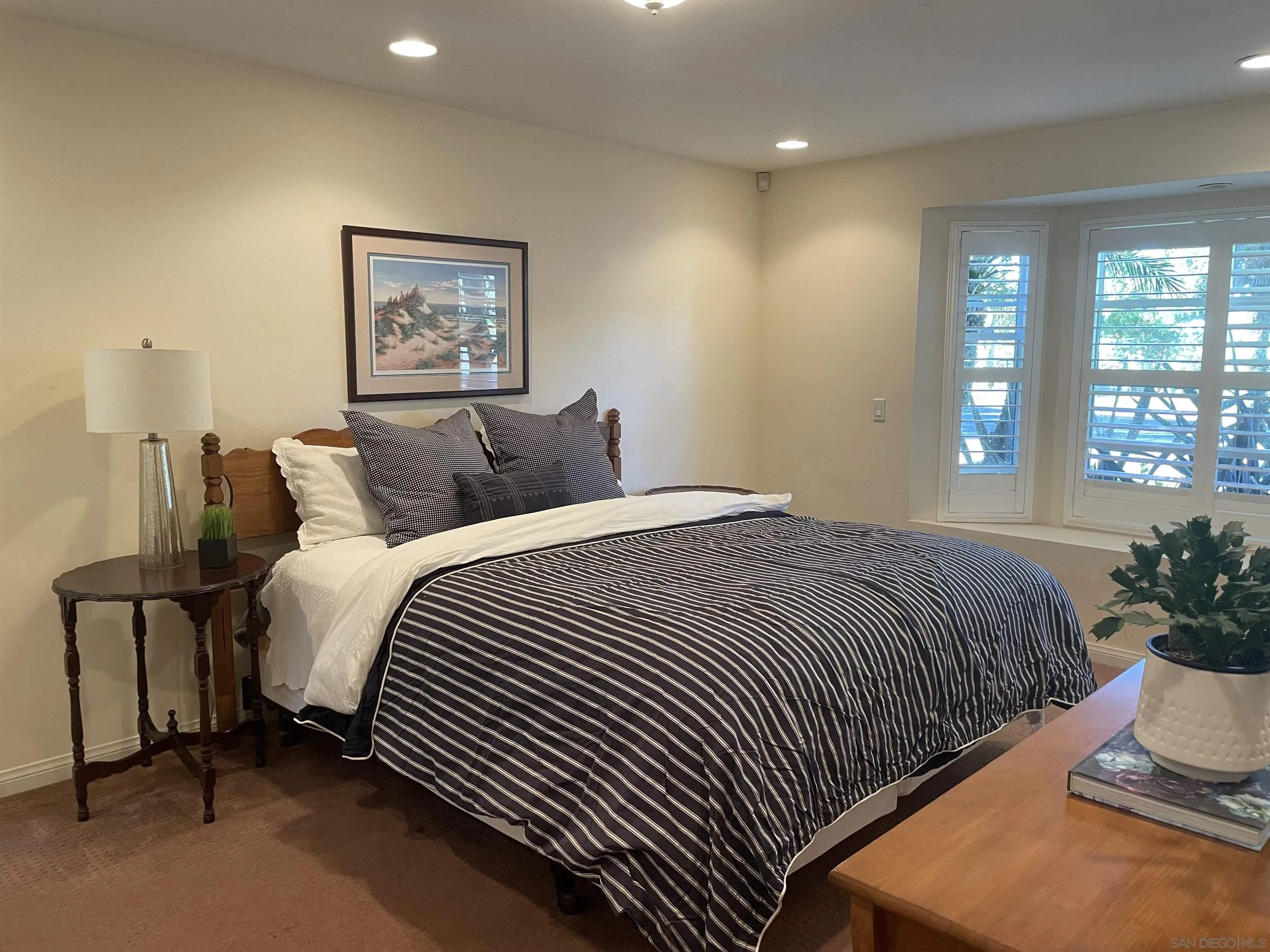 981 Cabrillo Avenue Coronado, CA 92118 - Photo 11 of 32 a bedroom with bed and window