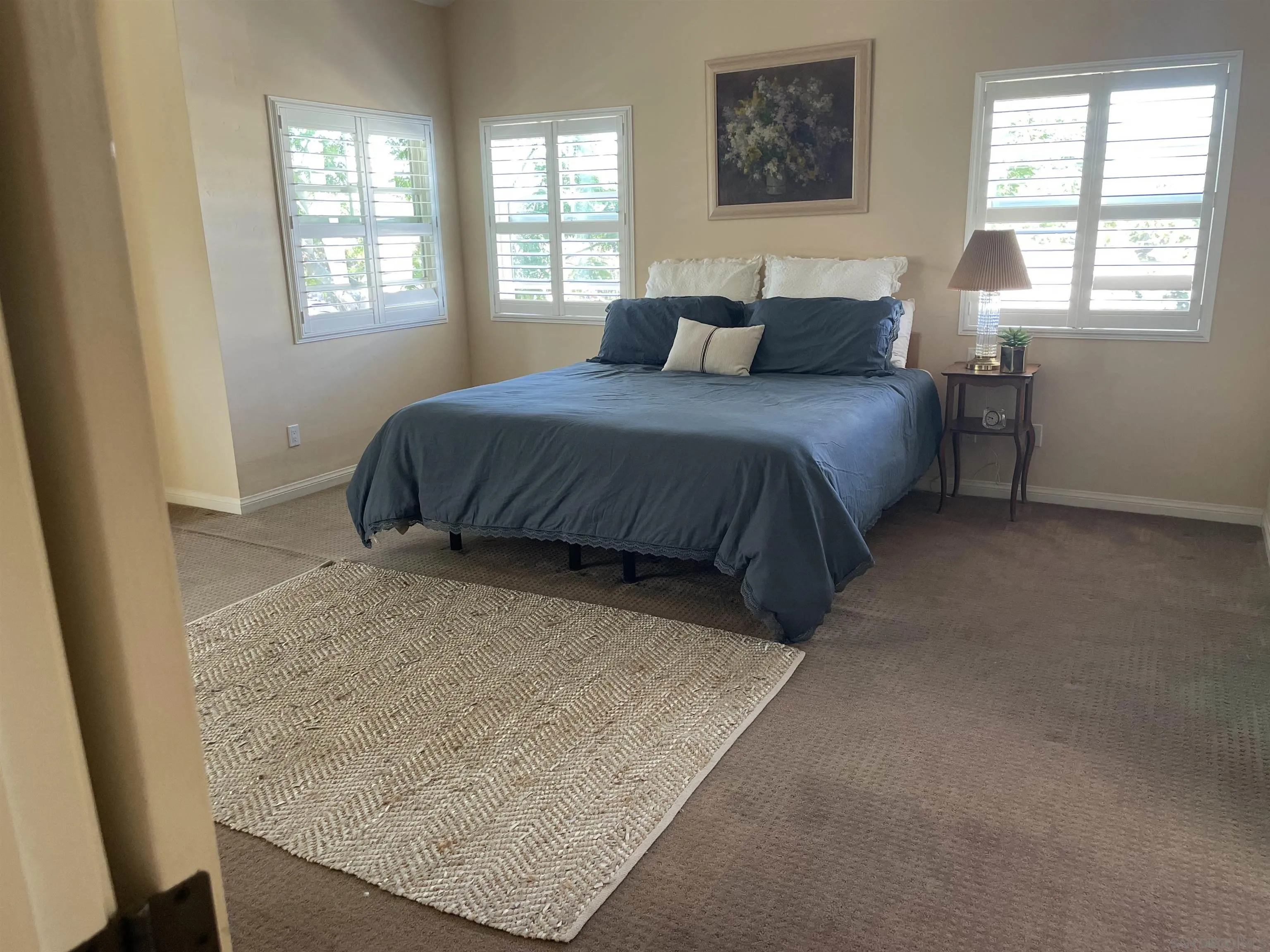 981 Cabrillo Avenue Coronado, CA 92118 - Photo 15 of 32 a bedroom with a bed and a window