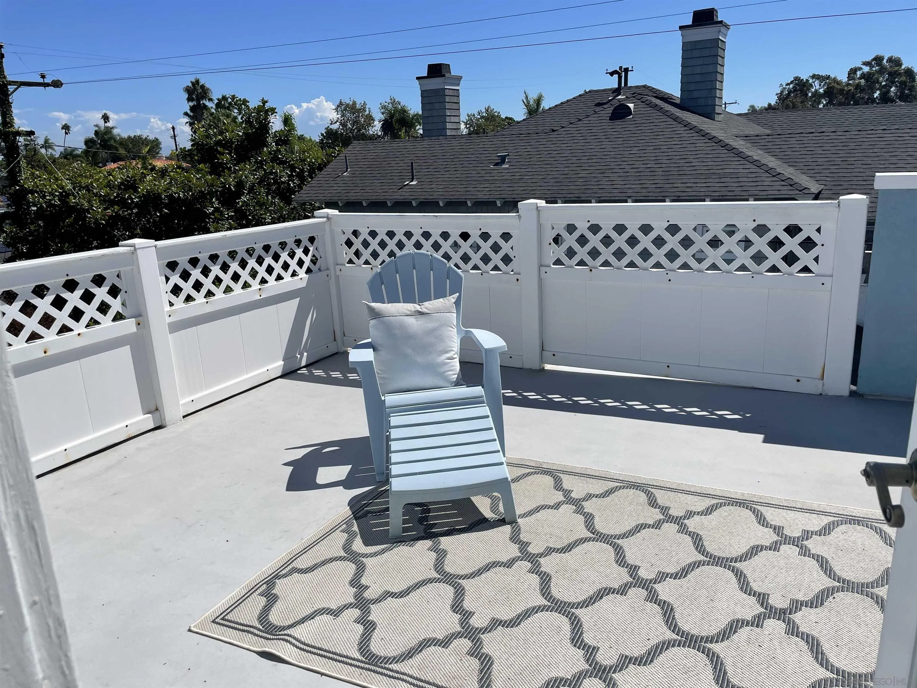 981 Cabrillo Avenue Coronado, CA 92118 - Photo 23 of 32 a view of a roof deck with wooden floor and fence