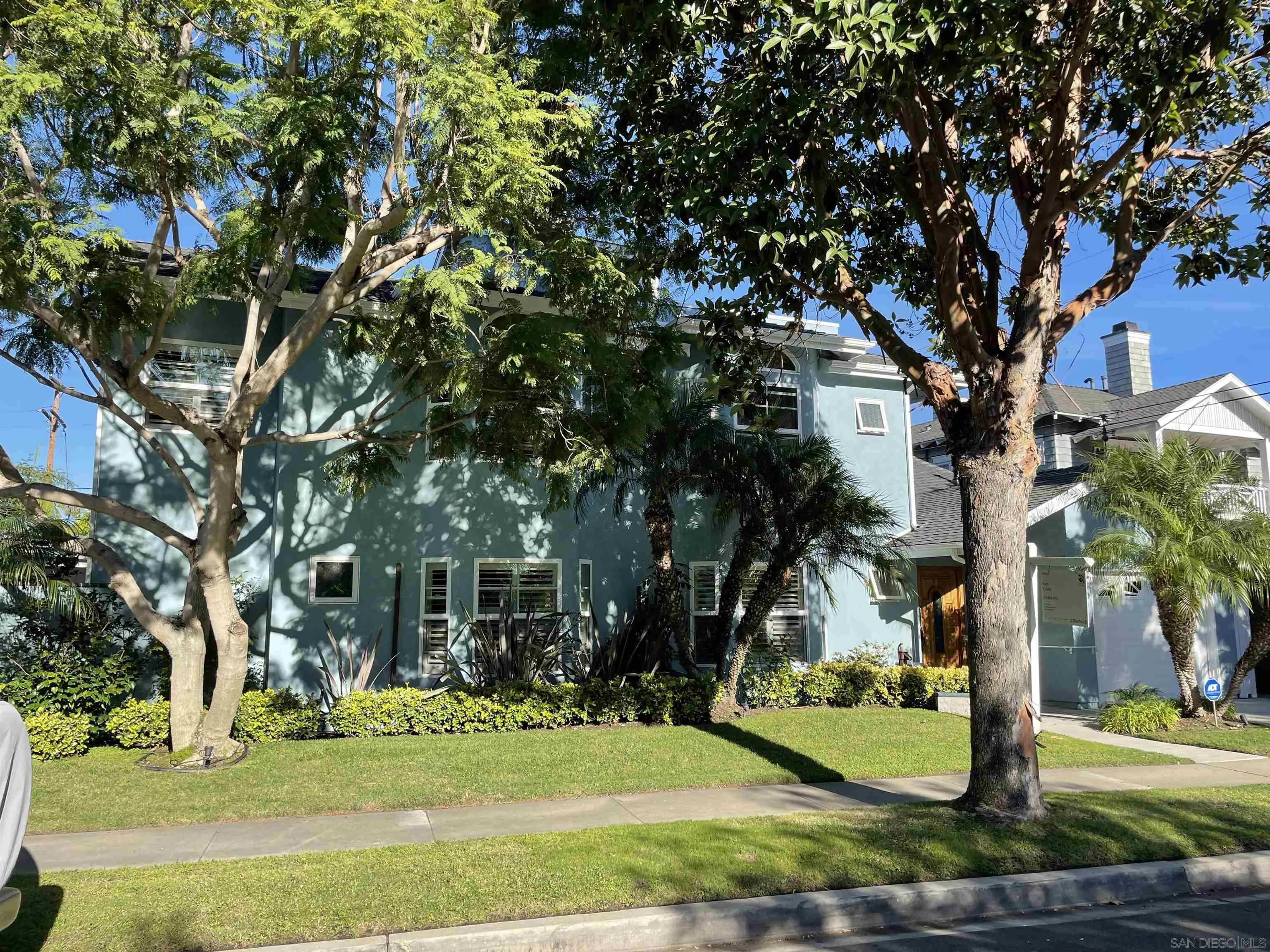 981 Cabrillo Avenue Coronado, CA 92118 - Photo 31 of 32 a front view of a house with a yard
