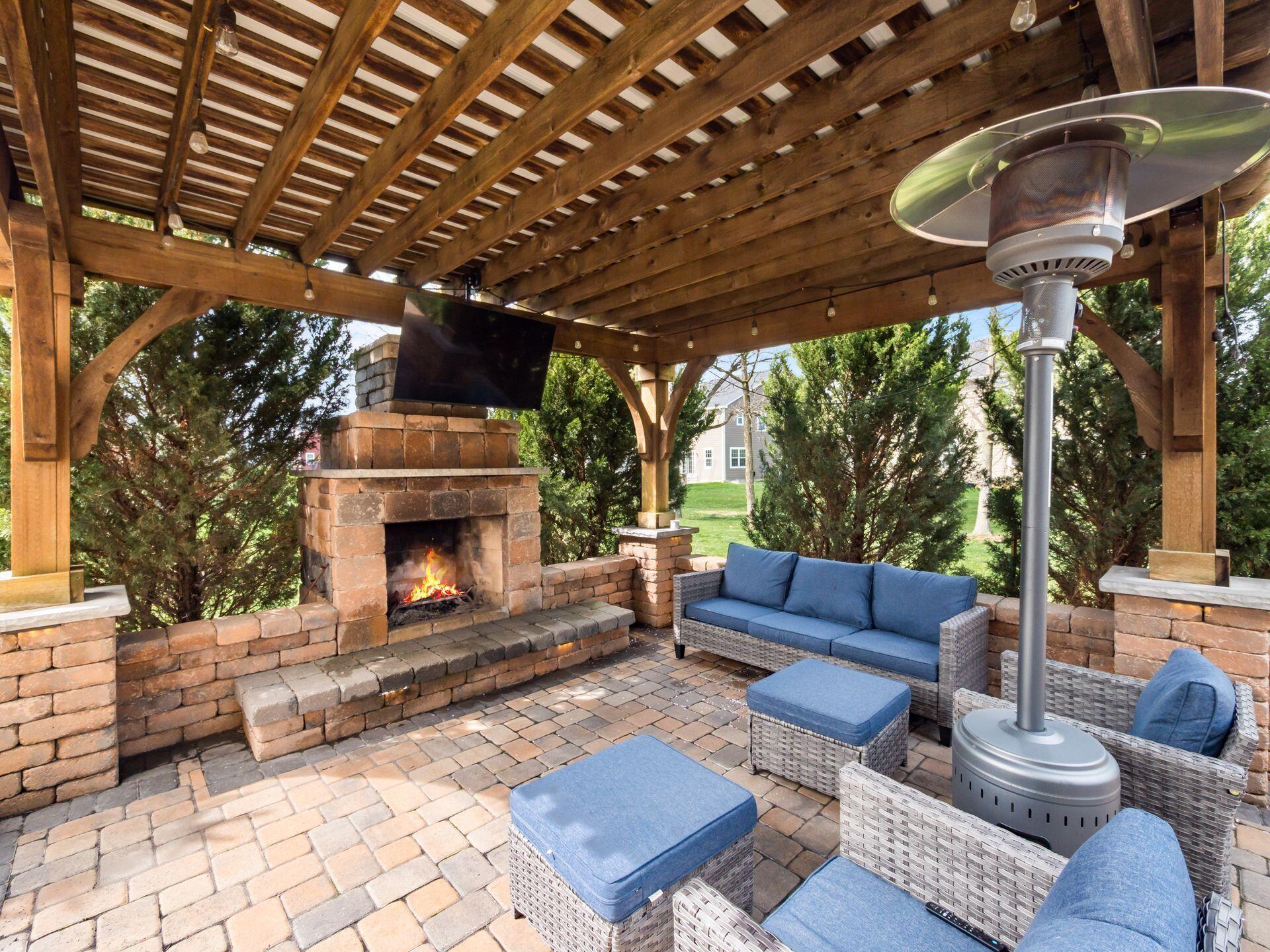357 Tipperary Loop Delaware, OH 43015 - Photo 58 of 71 Cedar pergola with outdoor fireplace and TV