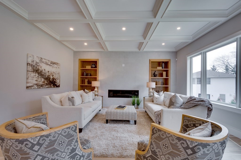 192 Evelyn Road Newton, MA 02468 - Photo 16 of 41 a living room with furniture and a large window